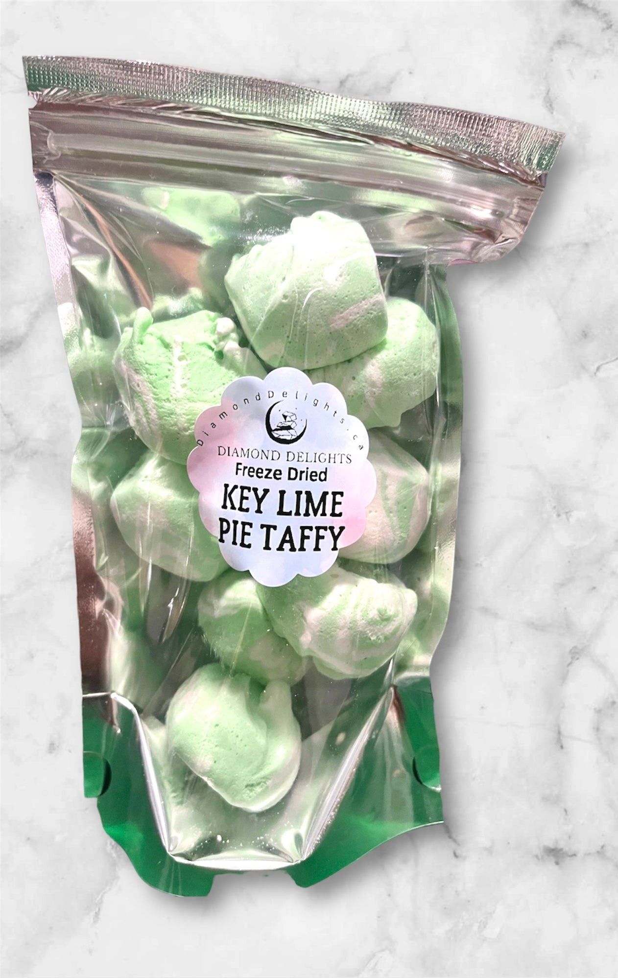 Bag of freeze-dried key lime pie taffy puffs with vibrant green color