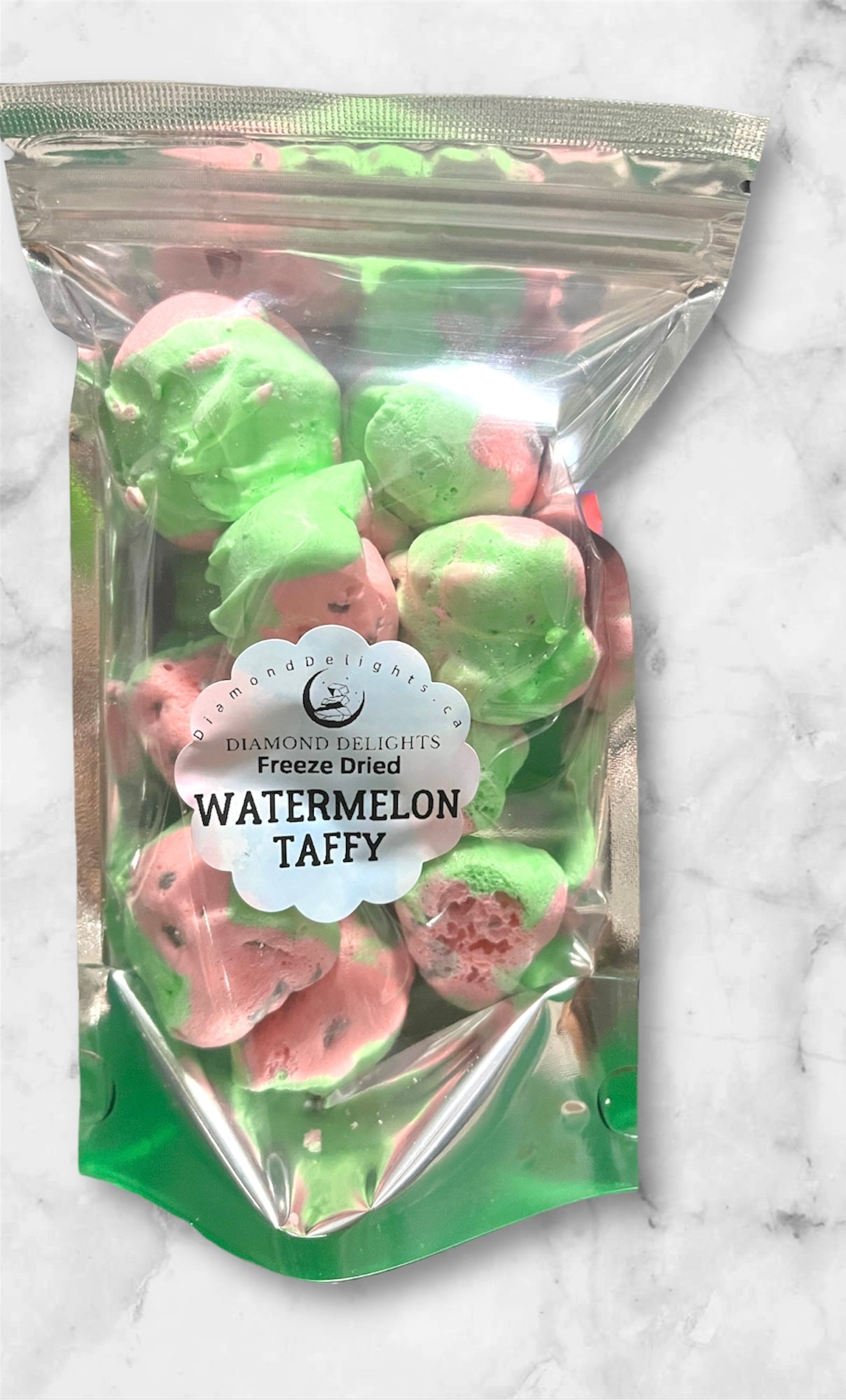 Holographic bag of freeze-dried watermelon taffy pieces
