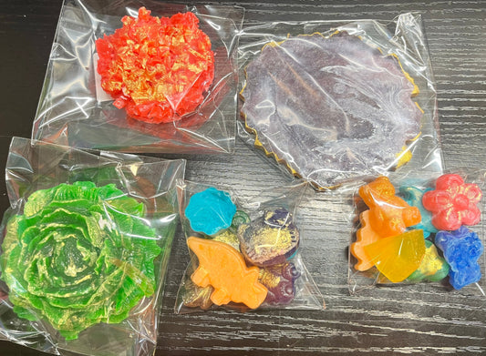 Assorted crystal candy in flower, geode, and cluster shapes in a clear bag from Diamond Delights