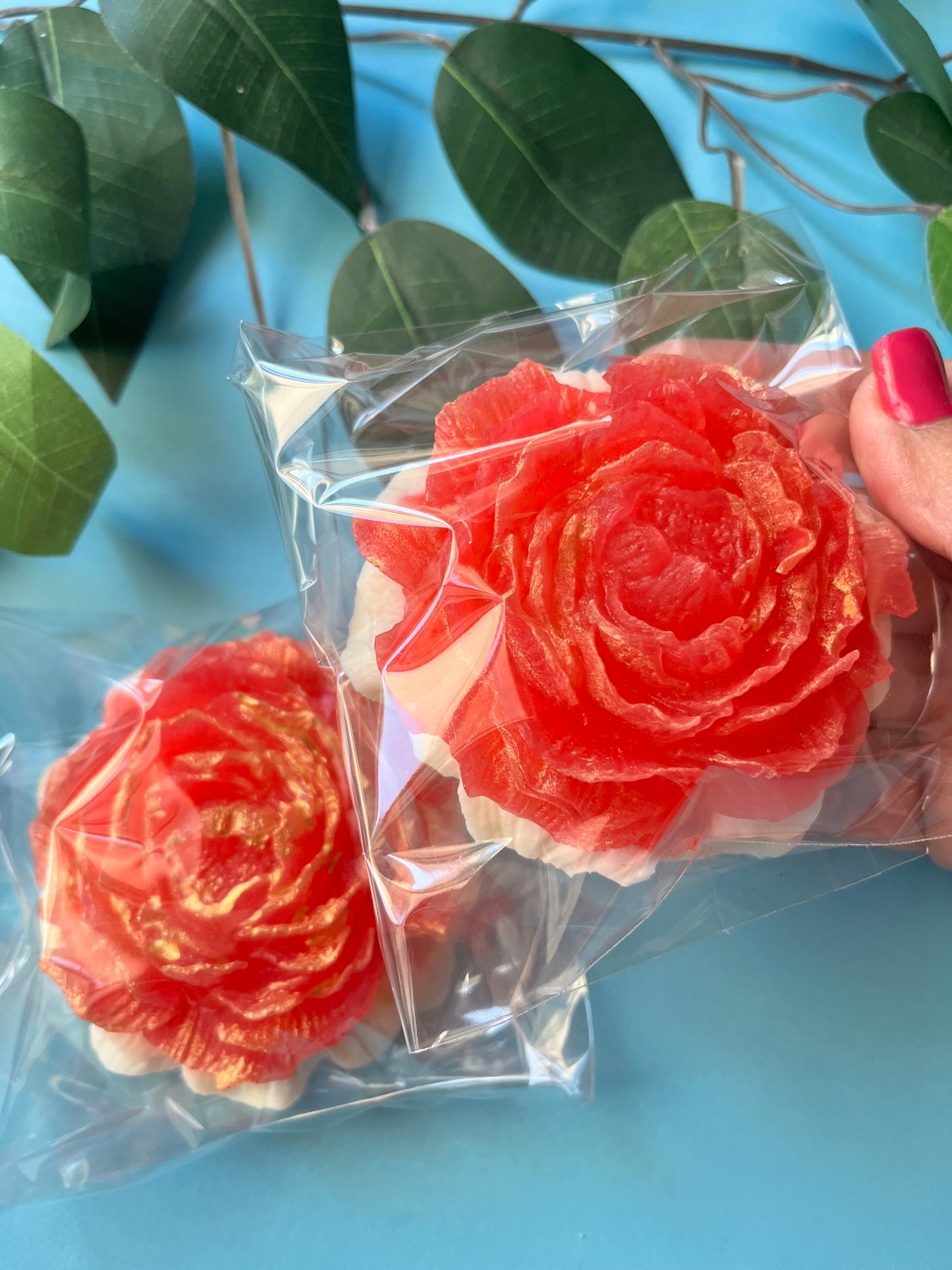 Close-up of shimmering rose-shaped crystal candy with golden highlights, Fruit Loops & Sweet Milk flavor.