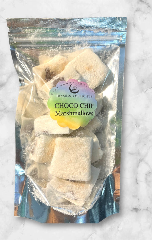 Bag of vanilla marshmallows with chocolate chips in a resealable pouch, fluffy and sugar-dusted.