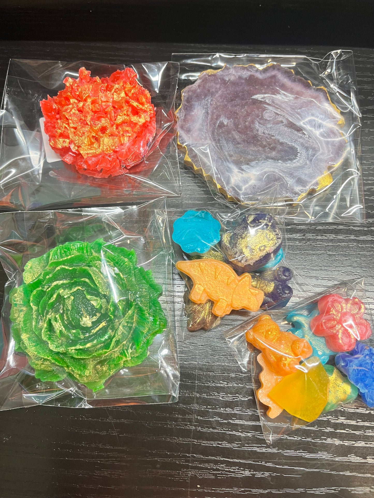 Assorted crystal candy box with a flower, geode, and cluster shapes in a clear bag from Diamond Delights