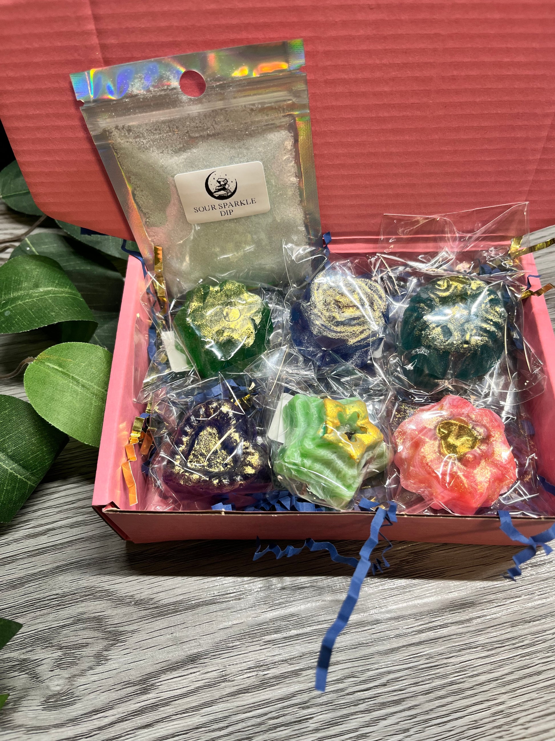 Close-up of assorted crystal candies with Gushers inside, showcasing vibrant colors and textures.