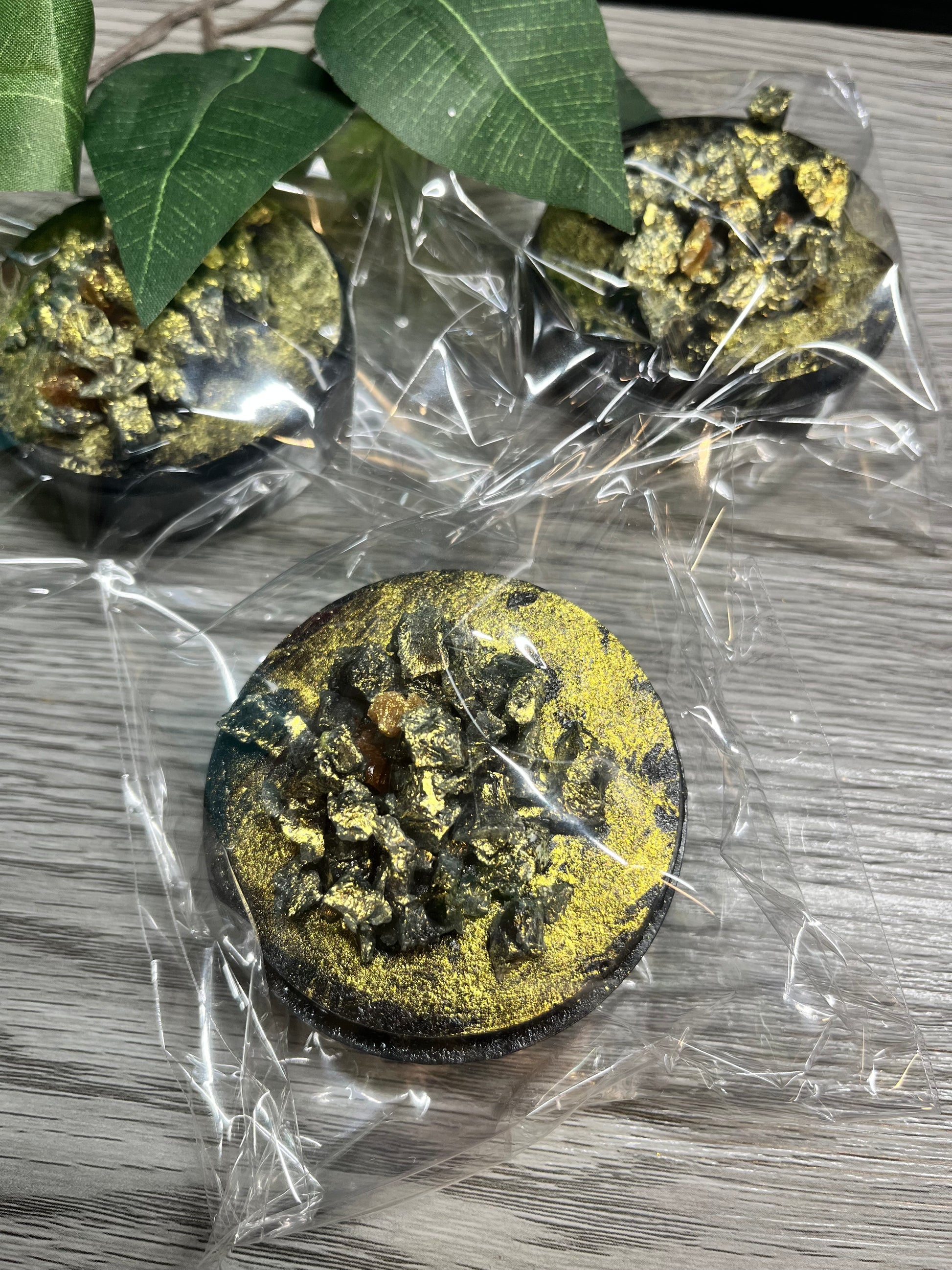 Stuffed amaretto crystal candy with creamy nut filling and gold shimmer