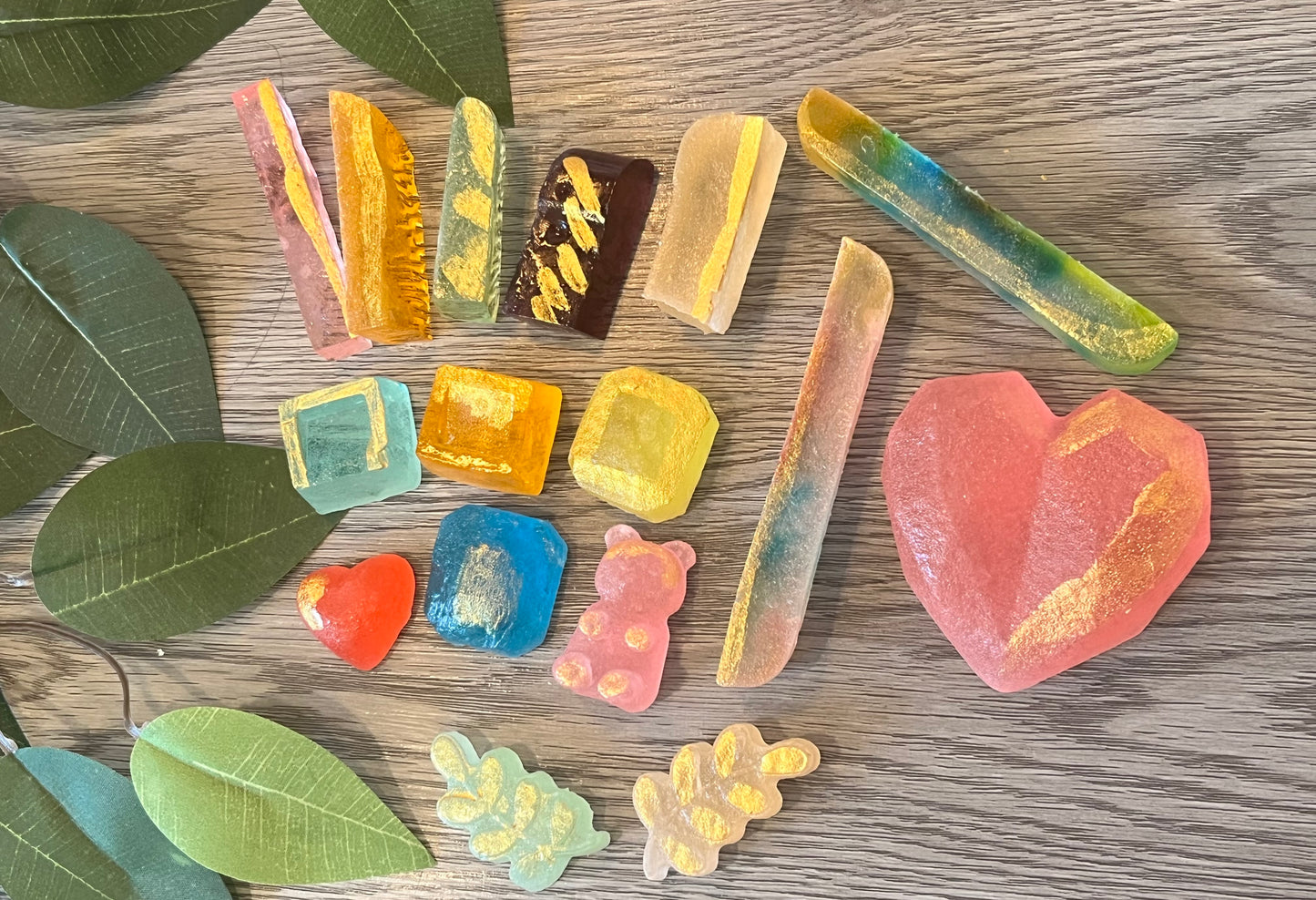 21 mini crystal candy pieces with red heart gem