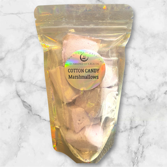 Resealable bag of soft pink Cotton Candy Dream Cloud Marshmallows, fluffy square cubes dusted in sugar.
